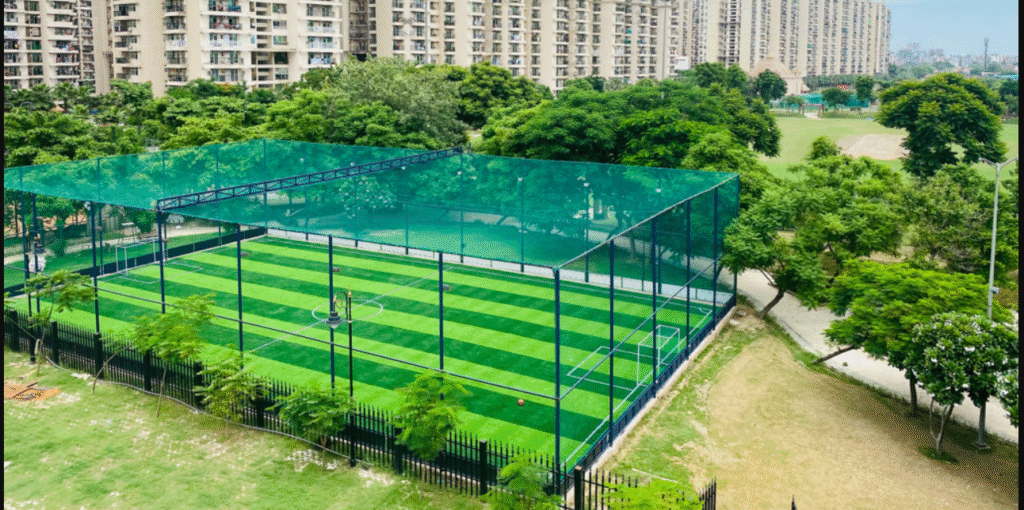 A badminton court in Sports Complex Near Gaur City